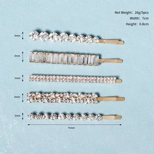Detailed view of five-piece gold rhinestone bobby pin set with precise measurements