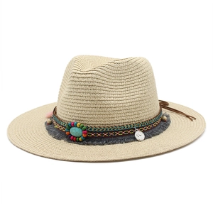 Westerse strooien cowboyhoed met kleurrijke kralen, turquoise steen en franjes voor het strand