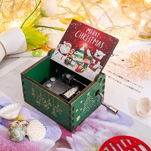 Macro shot of internal mechanical movement in a green wooden Merry Christmas music box