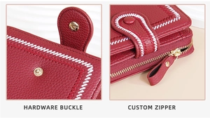 Detail of premium hardware buckle and custom zipper on red lychee texture wallet
