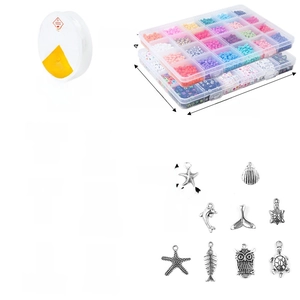 24-grid DIY jewelry kit with colorful glass beads, letter beads and ocean pendants