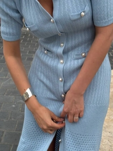 Sky blue knit short sleeve V-neck dress with pearl buttons and hollowed-out hem detailing