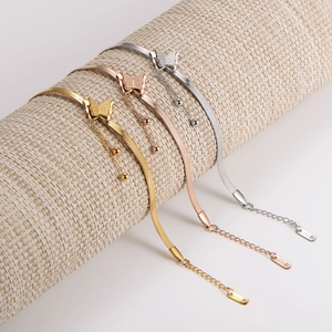 Three-color stainless steel snake chain bracelets with matte butterfly charms in gold and silver