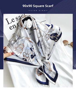 Detail of 90x90cm nautical silk scarf with anchor print styled on a white shirt