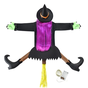 Halloween crashing witch decoration with LED lights and purple hair on white background