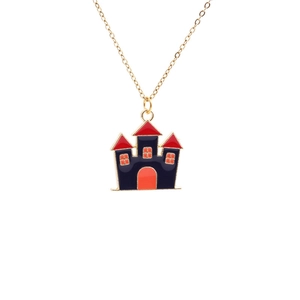 Halloween jewelry set featuring gold-toned castle pendant with blue and red enamel details