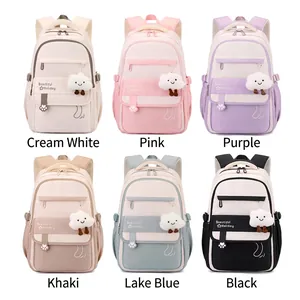 Lightweight waterproof school backpack for girls with cute cloud charm and star pattern