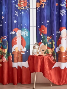 Close-up of blue Christmas curtain featuring Santa Claus, reindeer, and snowflakes patterns