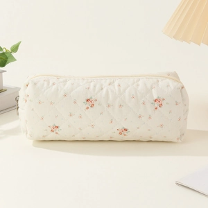 Quilted cotton cream floral makeup bag with zipper closure and cute floral pattern