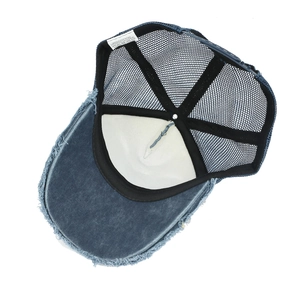 Distressed blue washed cotton trucker hat with torn brim and breathable mesh back