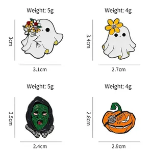 Halloween enamel badge set featuring ghost, witch and pumpkin motifs with rhinestone details
