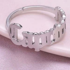 Detailed macro view of silver Capricorn zodiac adjustable ring with gothic openwork design