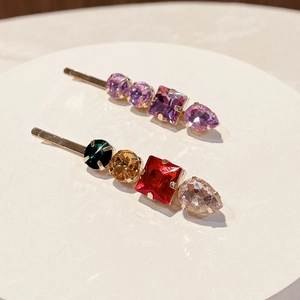 2-pack sparkling rhinestone hair clips with colorful gemstones on gold-plated bases