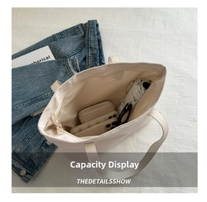 Top view of cream white tote bag interior showing spacious storage for daily essentials