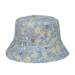 Women's floral cotton bucket hat in light blue with sweet meadow flower pattern print