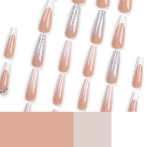 French tip press-on nails with silver glitter gradient and rhinestone accents