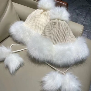 Winter chunky knit pom-pom trapper hat in cream and khaki with plush faux fur lining
