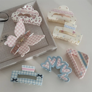 Floral and plaid patterned hair claw clip set for women in pastel pink and blue