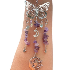 Silver butterfly suncatcher with purple amethyst, crescent moon and celestial sun face