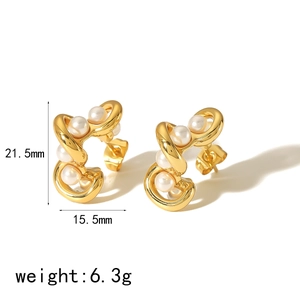Detail view of 18K gold plated pearl twisted hoop earrings with size specifications