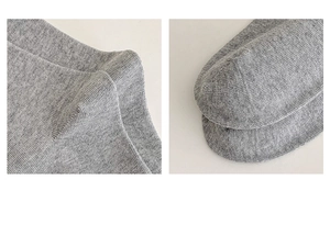 Detailed macro view showing the gray knit texture on the heel and toe of the cotton socks