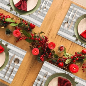 Christmas striped table runner and 4 placemats set on wooden table for winter decor