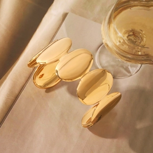 Minimalist 18K gold plated stainless steel oval bangle with high-polished mirror finish