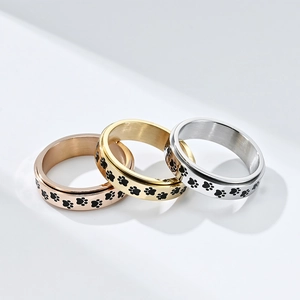Anillos giratorios de acero inoxidable con huellas de pata en tres colores