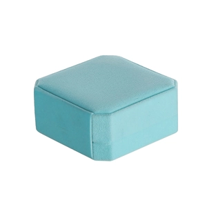 Close-up of tiffany blue velvet jewelry box for rings with octagonal design detail