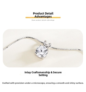 Detail of s925 sterling silver necklace with 1 carat zircon and delicate box chain