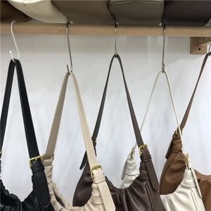 Collection of ruched cloud underarm bags in five colors with adjustable metal buckles