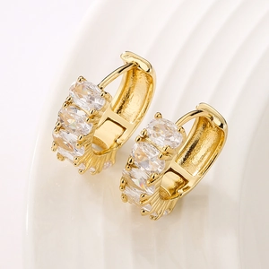 Luxurious gold-plated hoop earrings featuring three sparkling oval-cut zircon stones