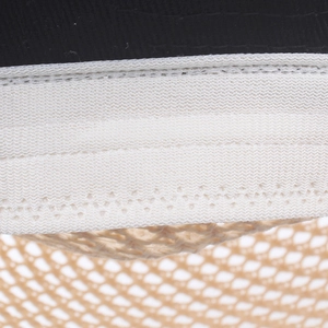 Detailed close-up showing black faux leather and white elastic bands on a breathable sun hat