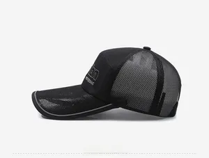 Close-up of black breathable mesh outdoor cap with extended brim and reflective trim