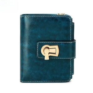 Women's compact oil wax leather wallet with gold buckle and RFID protection in teal blue