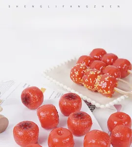 Macro shot of high-simulation PVC hawthorn model with realistic syrup texture for DIY crafts
