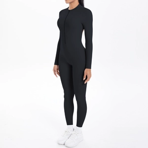 Detail of slim fit matte black long sleeve sports bodysuit with front zipper closure