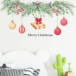 Detail of Christmas wall stickers with bells, red berries, and pine branch decorations