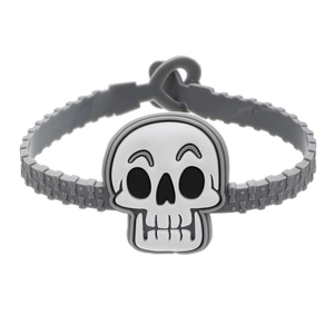Detail of adjustable gray silicone Halloween bracelet with a cute white skull character
