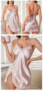 Close-up of pink satin nightgown with elegant lace trim and crisscross back straps