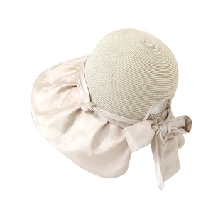 Beige wide brim straw sun hat with large satin ribbon bow for women beach vacation