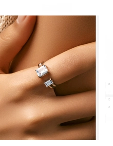 Detail of S925 sterling silver double-layer open ring with two blue rectangular stones