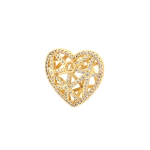 Macro detail of gold-plated hollow heart pendant with sparkling white cubic zirconia pavé