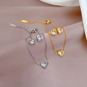 Titanium steel heart bracelet and stud earrings set with sparkling zircon in two colors