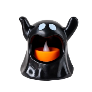 Halloween ghost LED electronic candle light in black and orange for spooky atmosphere