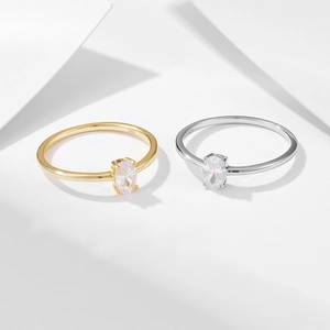 Minimalist S925 silver ring with oval cubic zirconia in gold and silver finish
