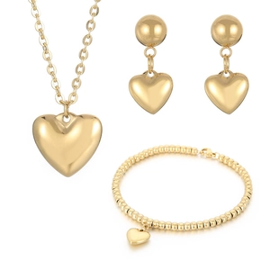 Polished gold titanium heart jewelry set with necklace earrings and beaded bracelet