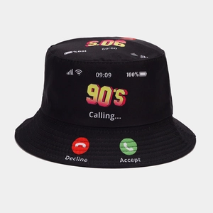Detail of black reversible bucket hat with Y2K style 90s calling graphic print