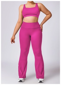Detail of rose red plus size yoga set with high waist flared pants and sports bra