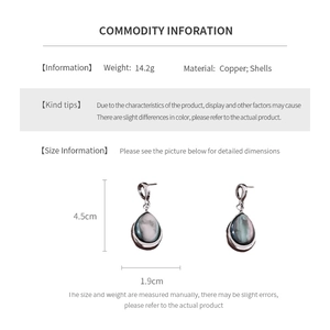 Detailed size and material chart for copper shell teardrop earrings with measurements